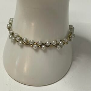 Gold tone twisted chain bracelet with faux seed pearls costume jewelry